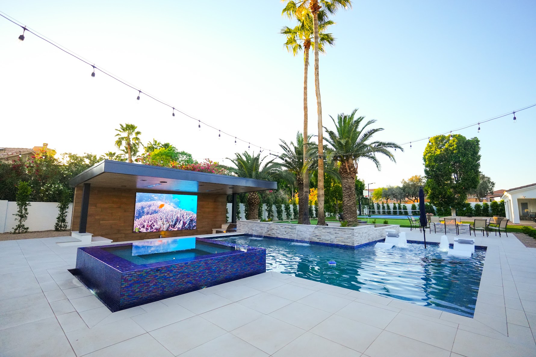 Luxury pool with integrated spa and water features